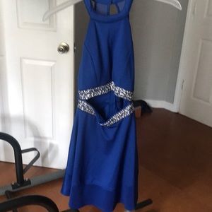 It is a royal blue short prom dress never worn.